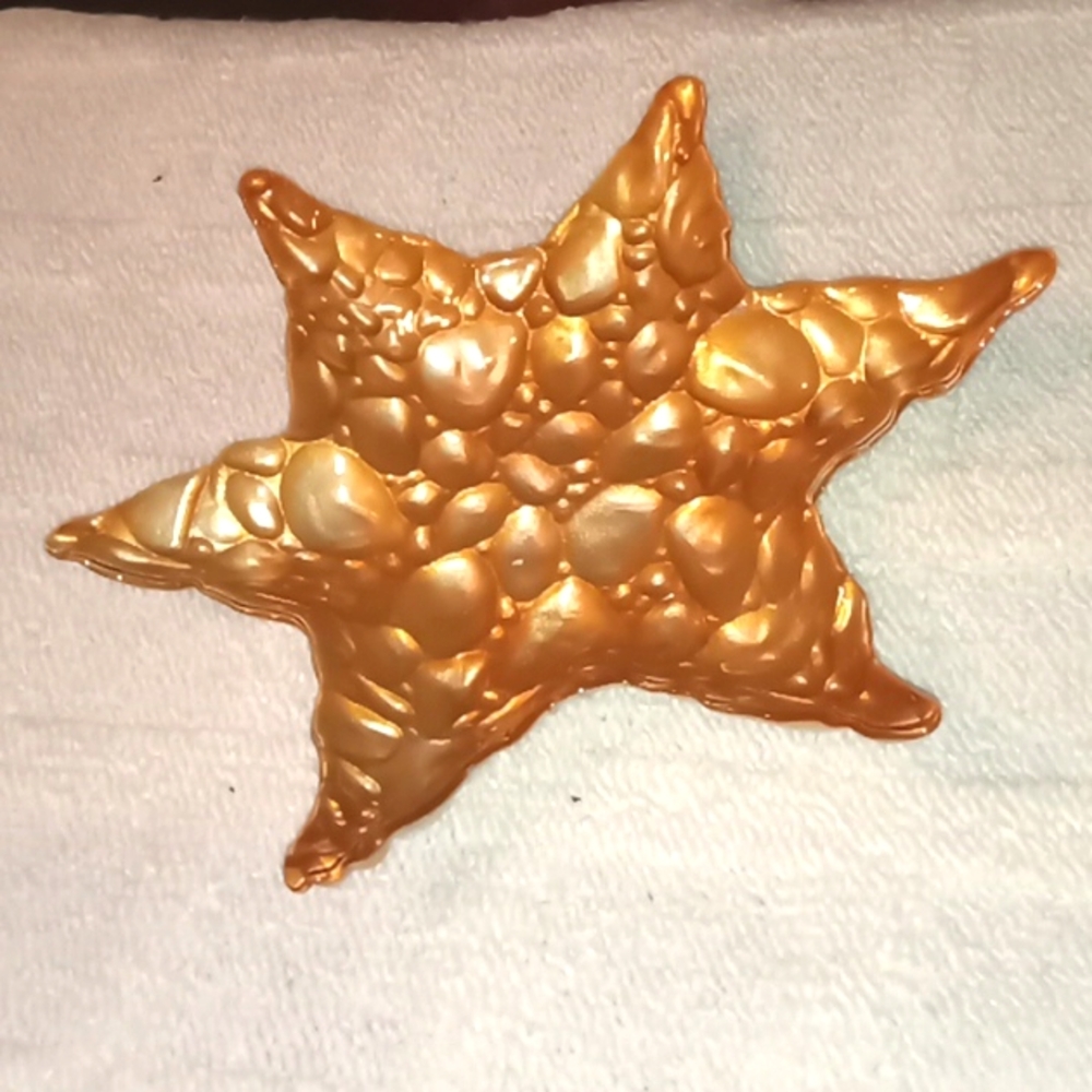 Star shape decor- Goldish tones- glass table decor